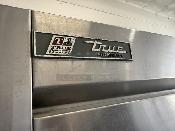 True T-72F-HC 3-door commercial freezer in excellent condition, 115V, fully tested. True logo and label visible.