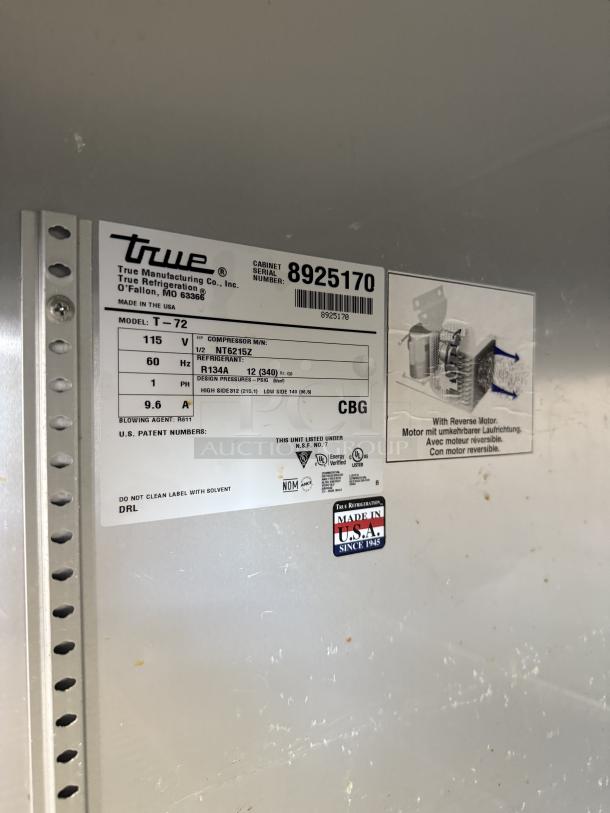 True T-72F-HC commercial freezer tag, showing model, voltage, and refrigerant details. Made in USA label visible.