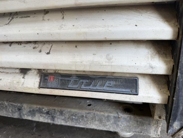 True GDM-72 glass door merchandiser in great condition. Tested and working. True logo displayed.