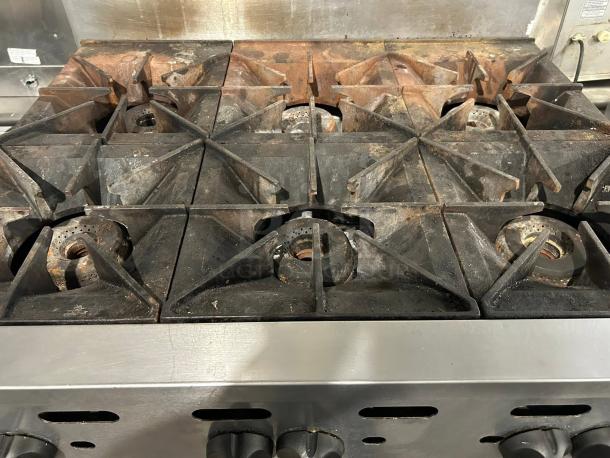 Vulcan VHP636 natural gas 36" 6-burner countertop range, 180,000 BTU, showing heavy-duty cast iron grates, fully tested and working.