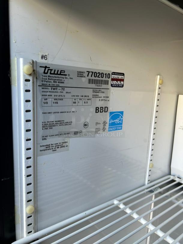 True TWT-72 worktop refrigerator, 72 3/8" with backsplash, tested and working. Tags show model and energy details.