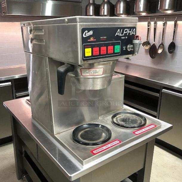 Curtis ALPHA 3DR 12-cup coffee brewer with three lower warmers, 120V, stainless steel, fully tested and working.