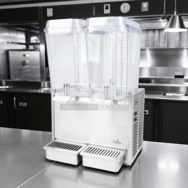Crathco D25-4 refrigerated drink dispenser with two 5-gallon bowls. Pre-mix, 115v, stainless steel, fully tested and working.