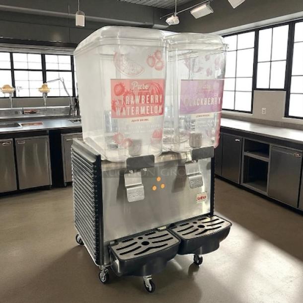 Crathco D25-4 refrigerated drink dispenser with two 5-gal bowls, pre-mix, 115v. Stainless steel, fully tested, great condition.