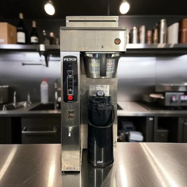 Fetco CBS-2051e E51016b 1.5 Gallon EXTRACTOR® Coffee Brewer in excellent condition, tested and working, stainless steel.