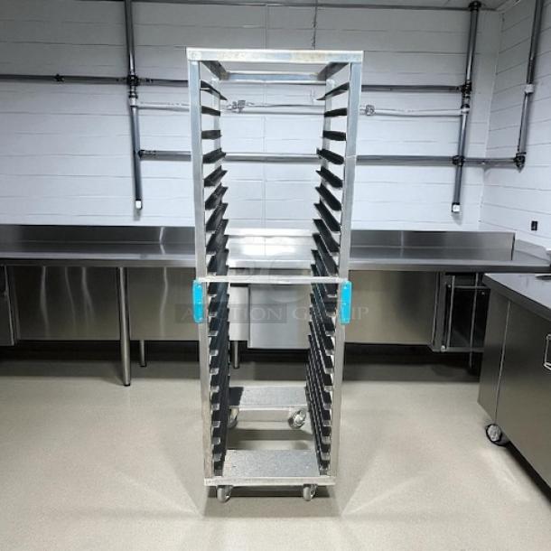 Like new bakery sheet pan rack with smooth rolling casters and multiple pan slots, ideal for commercial use.