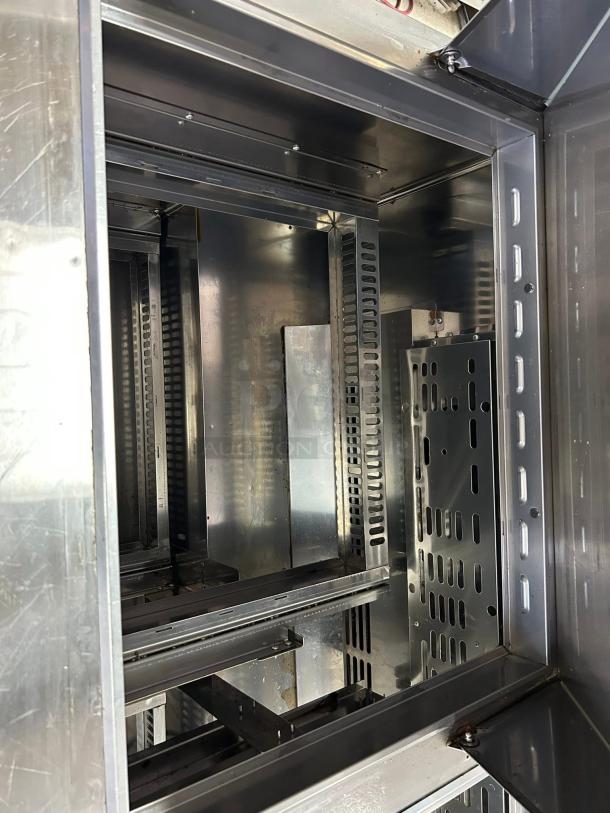 Turbo Air TST-60SD-24-D4-N refrigerated prep table interior, stainless steel, excellent condition, fully tested.