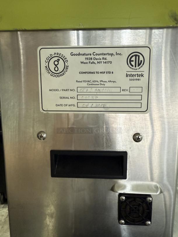 Goodnature CT-7 commercial cold press juicer, used, fully tested, with visible label details, 115V, stainless steel body.