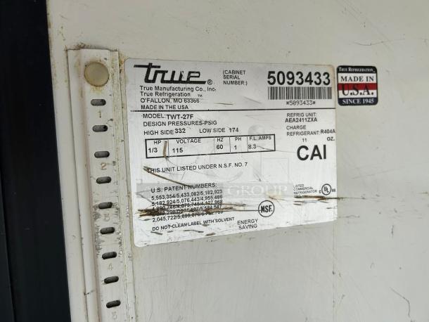 True TWT-27F-HC 28" Worktop Freezer tag showing model, voltage, refrigerant R404A, NSF and UL certification.