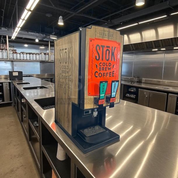 Stōk CreaMiser 230 cold brew coffee dispenser, 110V, featuring two levers for black and vanilla flavors. Fully tested and working.