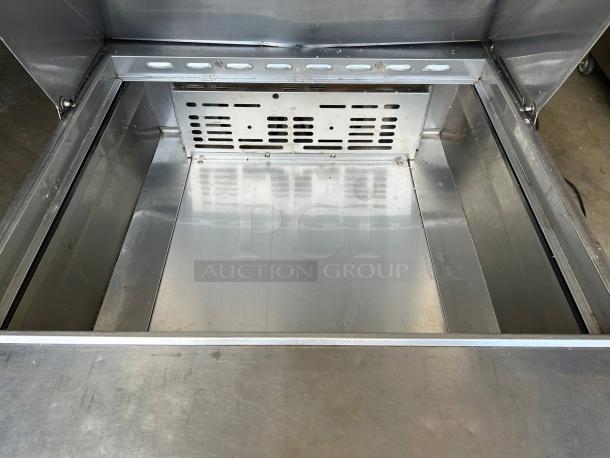 Turbo Air MST-28-N stainless steel refrigerated sandwich prep table interior, showing clean surfaces and cooling vents.