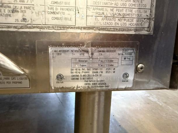 Electrolux AOS202GTP1 Combi Oven label showing model, gas rating, serial number, and regulatory marks.