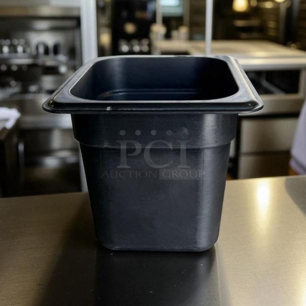 Cambro black 1/6 size deep food storage container, 6-inch depth, clean, compact, durable design for efficient storage.