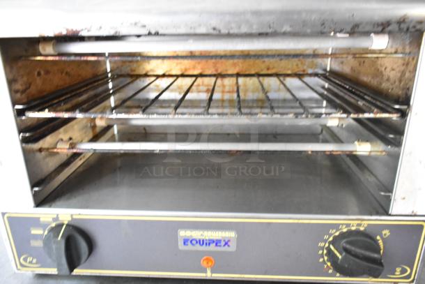 EQUIPEX countertop oven with adjustable temperature dial, showing interior racks and signs of wear. Ideal for mobile kitchens.