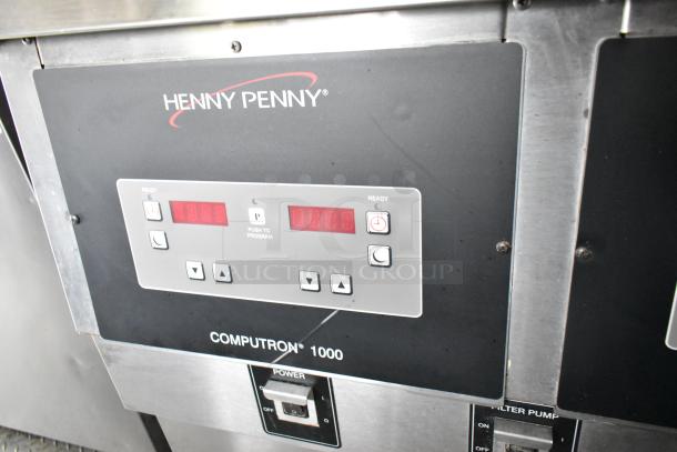 Henny Penny Computron 1000 control panel on food trailer, featuring digital display and operational buttons.
