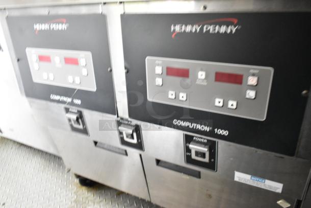Henny Penny Computron 1000 fryer controls inside Popeyes mobile kitchen trailer, in good condition.