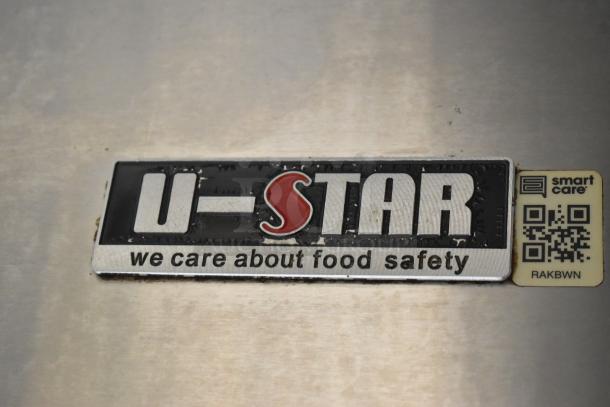 U-STAR label on kitchen equipment, stating "we care about food safety," with a QR code and "smart care" note.