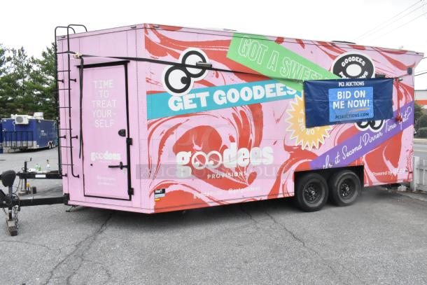 Pink 2020 Goodees food trailer with colorful graphics. Includes cooler, freezer, blender, shelves, sinks. Clear title.