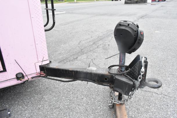 Pink food trailer hitch detail; chains and wiring visible. Ready for use with cooler, freezer, sinks. VIN 4S9S1EF26LW364359.