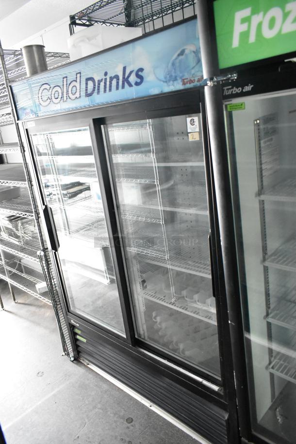 2020 Goodees Food Trailer with dual-door cooler. Features shelving, sinks, and appliances. VIN 4S9S1EF26LW364359.