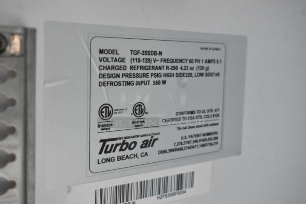 Label of Turbo Air appliance, Model TGF-35SDB-N, showing voltage specs, refrigerant details, and certification logos.