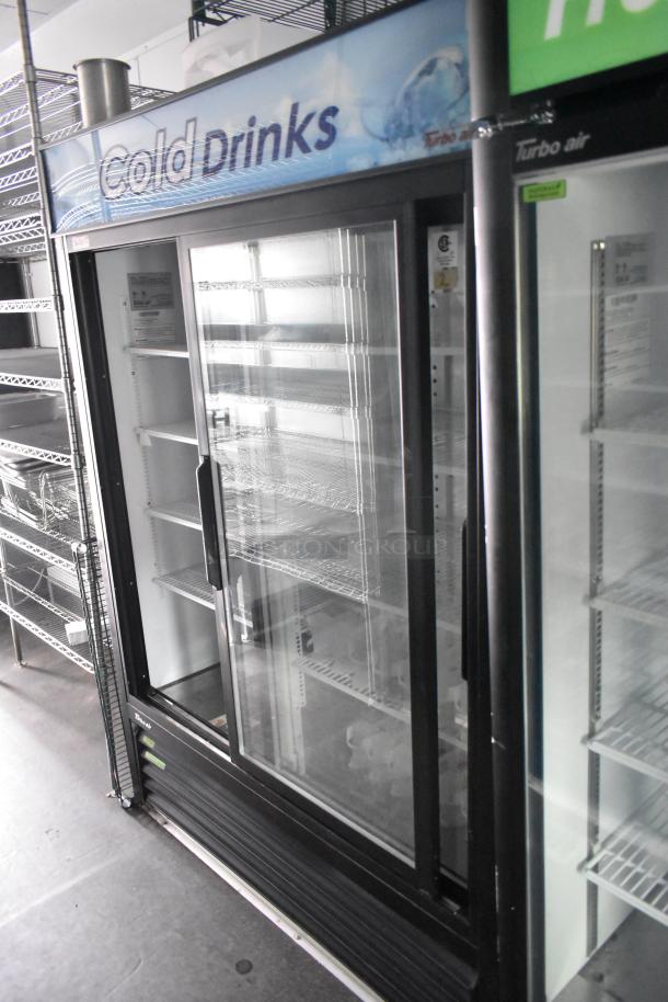 2020 Goodees food trailer interior with two-door cooler, shelving units, and sinks. Clear title included.