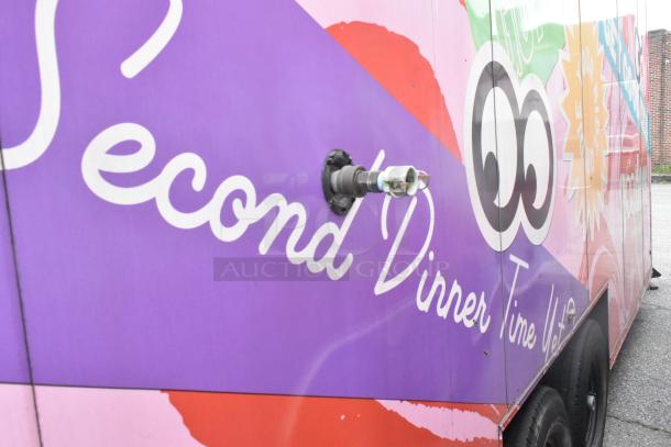 2020 Goodees food trailer with colorful exterior, featuring logos and text. Equipped with cooler, freezer, and appliances.