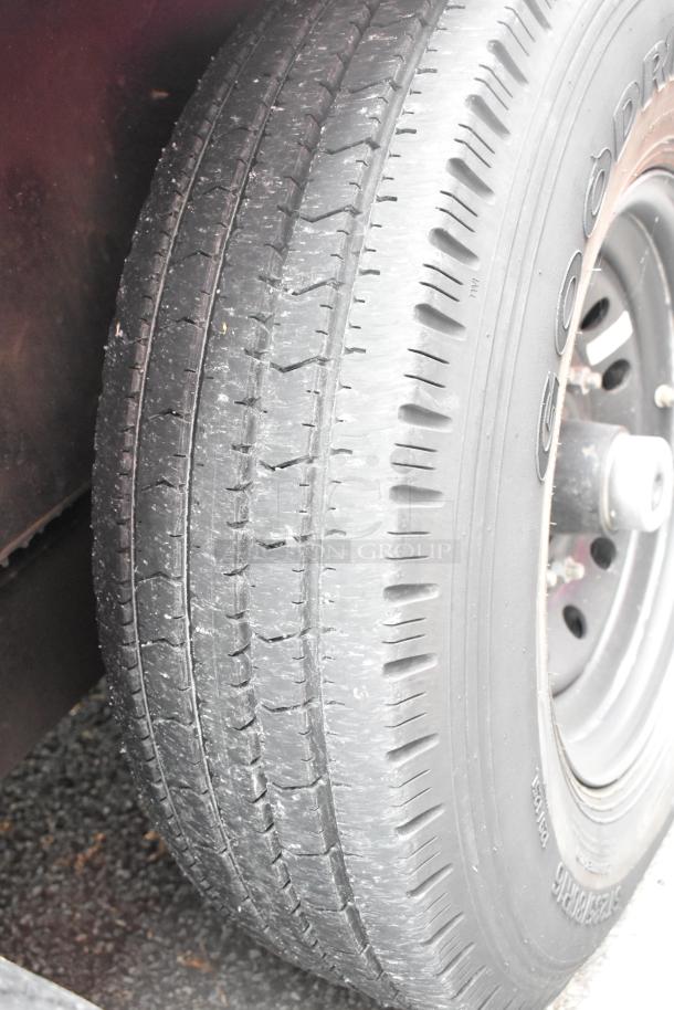 Tire detail on a 2020 Goodees food trailer, showing tread condition. Clear title VIN: 4S9S1EF26LW364359.