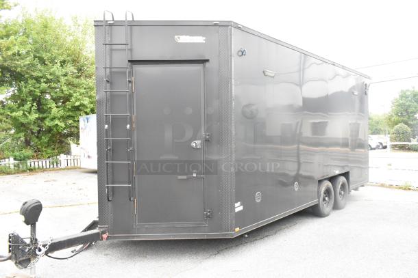 2020 Southern Dimensions Group trailer, GVWR 6,350 KG. Black exterior, dual axles, rear ladder. Clear title.