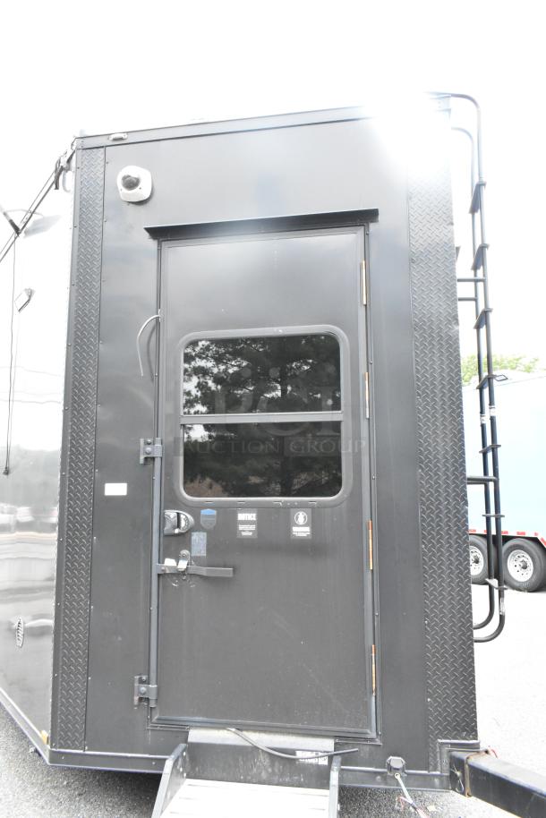 2020 Southern Dimensions Group trailer, black exterior, ladder, diamond plate detailing, GVWR 14,000 lb, clear title.