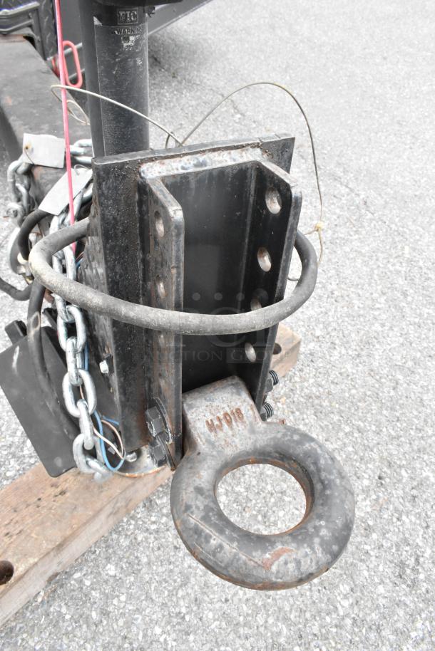 2020 Southern Dimensions Group Trailer hitch showing metal components, chains, and a loop with "HJD18" marking. GVWR 6,350 KG.