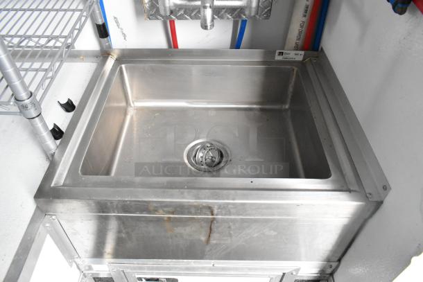 Stainless steel sink inside 2020 Southern Dimensions Group Trailer. Clean, with visible plumbing fixtures.