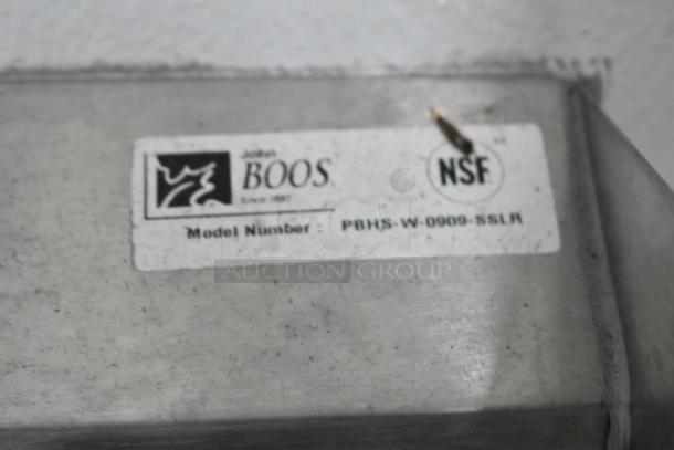 Metal label showing John Boos logo, NSF certification, and model number PBHS-W-0909-SSLR on a trailer part.