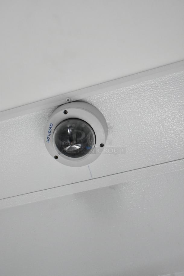 Ceiling-mounted Avigilon security camera in 2020 Southern Dimensions Group Trailer.