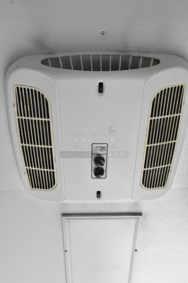 Ceiling-mounted air conditioning unit in the 2020 Southern Dimensions Group Trailer, model Classic Mach, shown for auction.