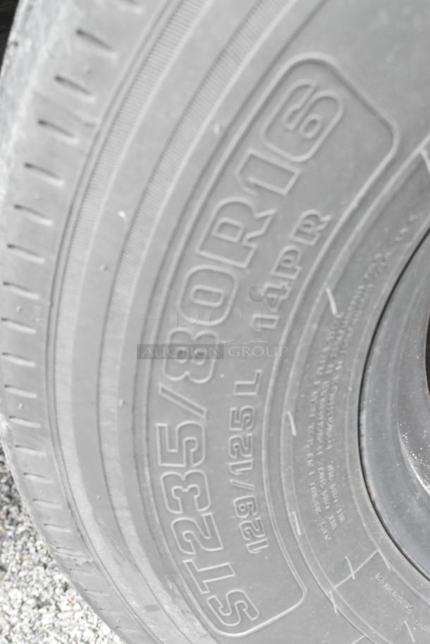 Close-up of tire on 2020 Southern Dimensions Group Trailer, showing marking "ST235/80R16 129/125L 14PR" for sale.