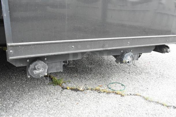 2020 Southern Dimensions Group trailer underside, showing axles and hitches. GVWR 6,350 KG. Sold with clear title.