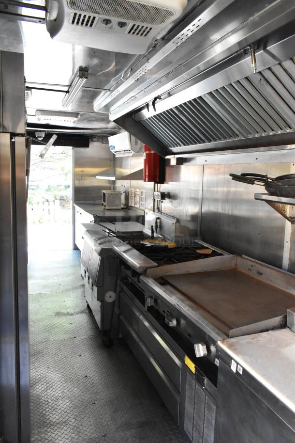 Brand new 2019 food trailer with grease hood, Henny Penny 2 bay fryer, coolers, freezers, and prep tables. Clear title.