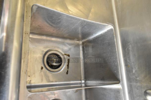 Stainless steel sink in fully outfitted 2019 food trailer, equipped for diverse catering needs, clear title included.