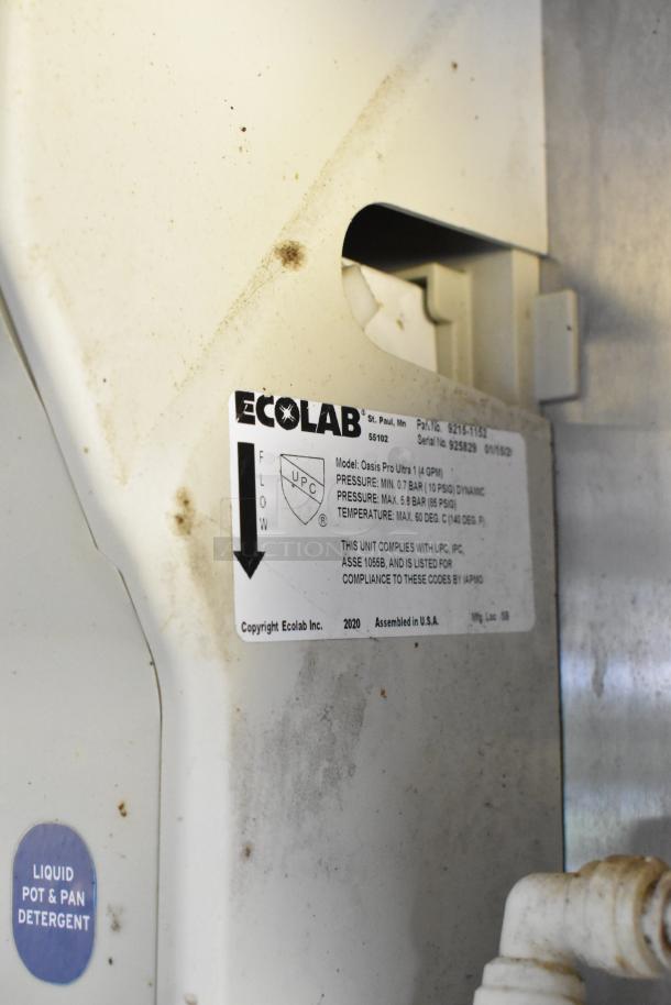 Ecolab Oasis Pro Ultra 1 system, with label detailing model and compliance info, made in 2020, for liquid detergent.
