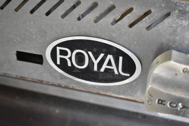 Close-up of a Royal brand appliance knob on a 2019 fully outfitted food trailer. Features range, fryer, coolers, and more.