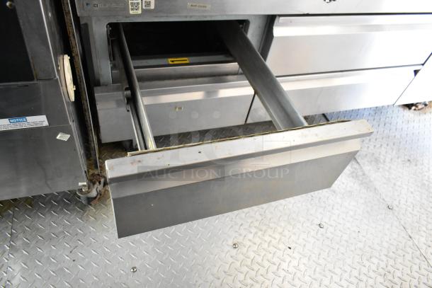 Stainless steel oven drawer part of a fully equipped 2019 food trailer kitchen. Includes grease hood and Henny Penny fryer.