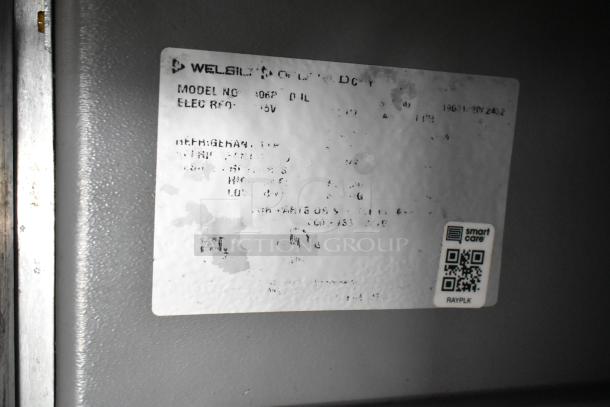 Welbilt equipment label with model no. 006P, detailing electrical requirements. Slight wear visible. Includes QR code for Smart Care.
