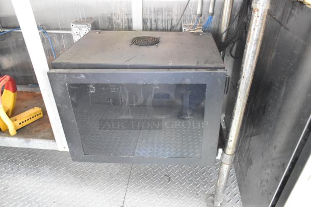 Brand new 2019 fully outfitted food trailer featuring black appliance housing, electrical outlets, and diamond plate flooring.