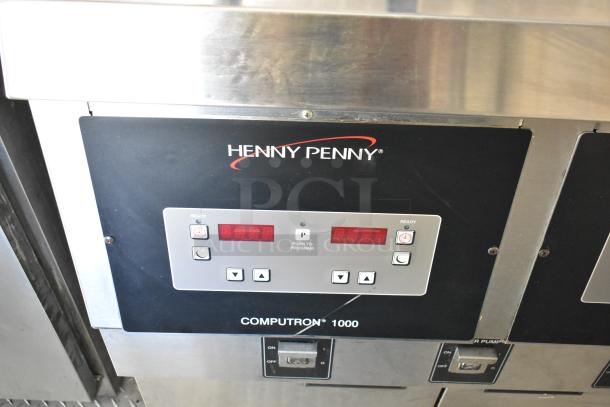 Henny Penny Computron 1000 control panel on a fully outfitted food trailer. Includes digital displays and function buttons.