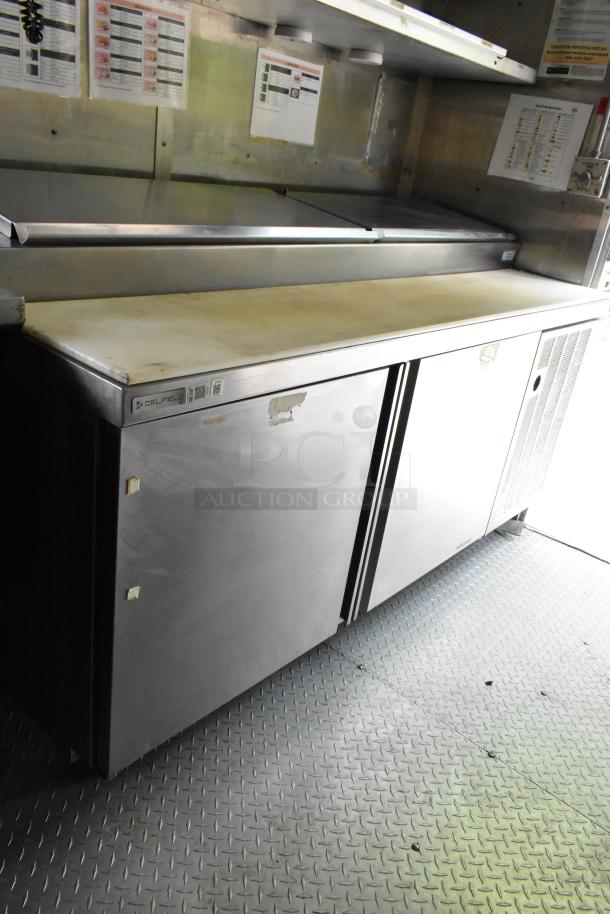 Brand new 2019 food trailer interior. Features Delfield prep table and dual coolers on diamond plate flooring. Perfect condition.