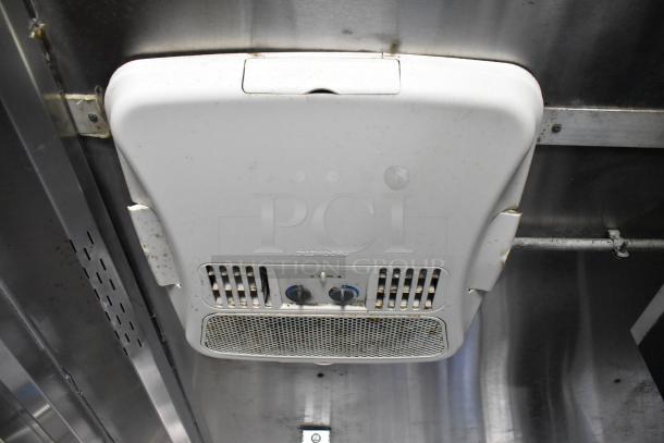 Ceiling-mounted vent fan in new 2019 food trailer kitchen, featuring adjustable controls and sleek design for ventilation.