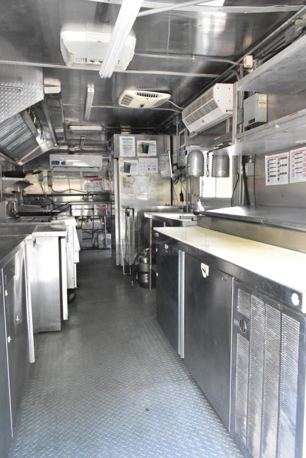 Brand new 2019 fully outfitted food trailer with grease hood, fryers, coolers, prep tables, range, clear title.