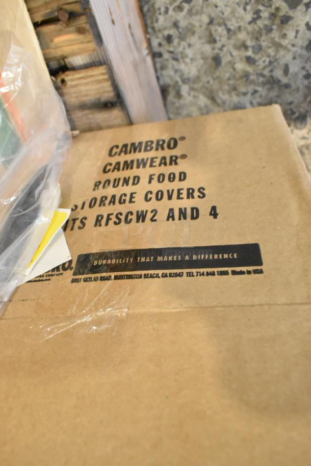 Cardboard box labeled "Cambro Camwear Round Food Storage Covers," shown in brand new condition.