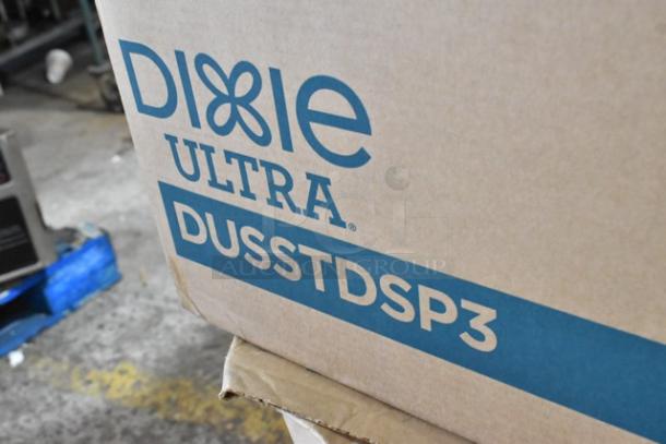 Cardboard box with "Dixie Ultra DUSSTDSP3" label. Box likely contains cutlery dispensers. Scratch and dent condition.